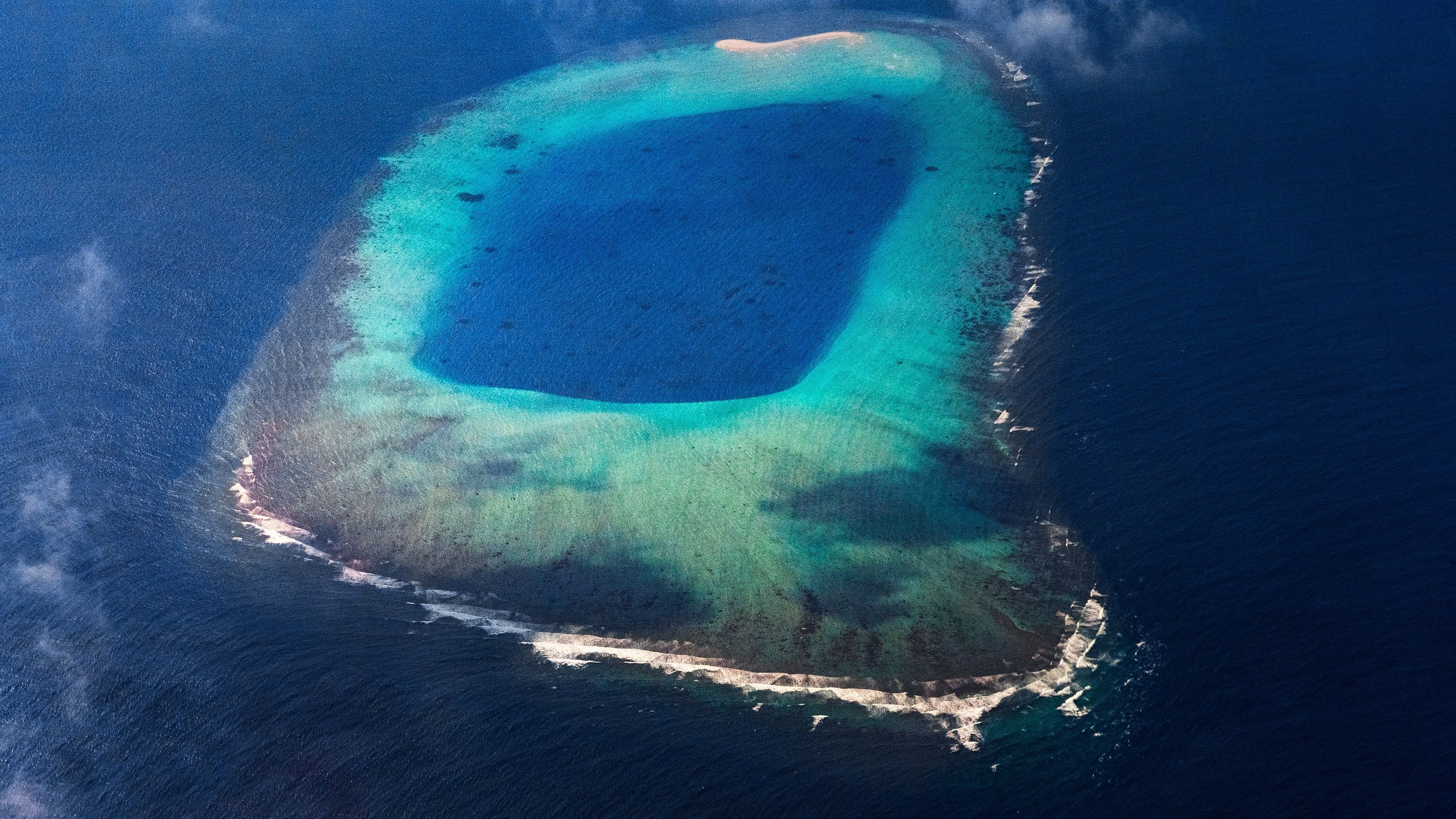 Reef-ringed lagoon in open ocean